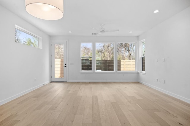 2209 Mcfly Pl, Austin, TX 78723 - empty room featuring a ceiling fan, healthy amount of natural light, light wood-type flooring, and recessed lighting