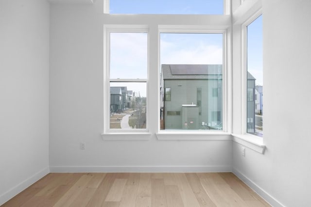 2209 Mcfly Pl, Austin, TX 78723 - unfurnished room featuring wood finished floors and baseboards