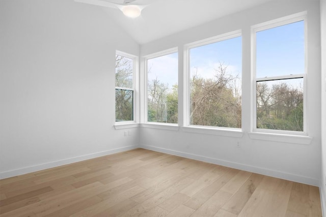 2209 Mcfly Pl, Austin, TX 78723 - empty room with light wood finished floors and lofted ceiling