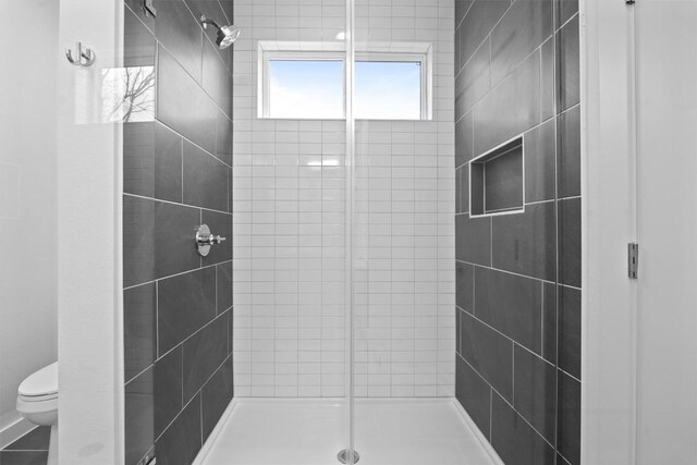 2209 Mcfly Pl, Austin, TX 78723 - full bathroom with a stall shower and toilet