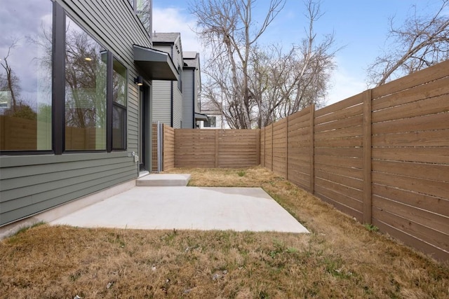 2209 Mcfly Pl, Austin, TX 78723 - fenced backyard featuring a patio area