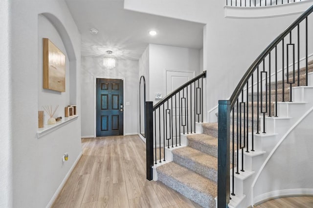 5833 Bianca Dr, Round Rock, TX 78665 - foyer with wood finished floors, stairs, and recessed lighting