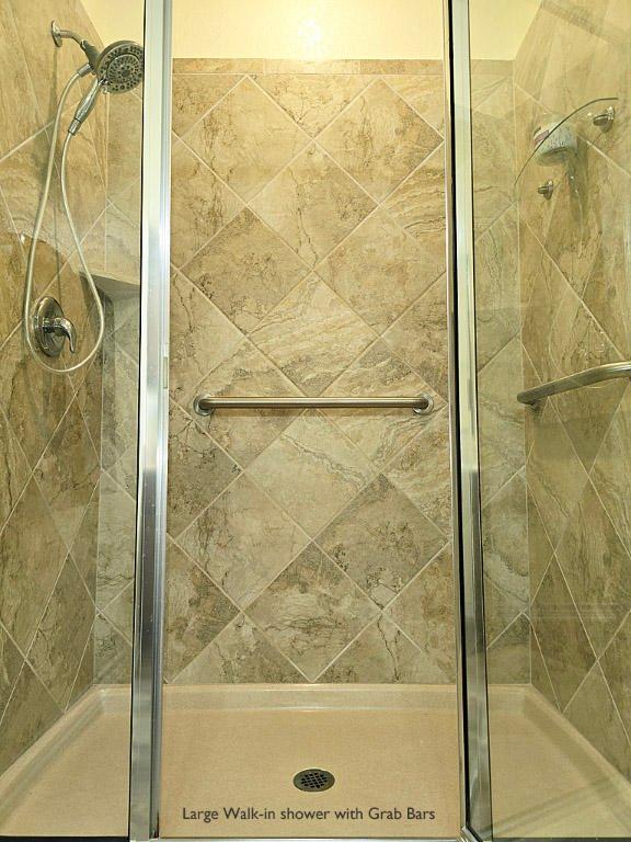 full bath featuring a shower stall