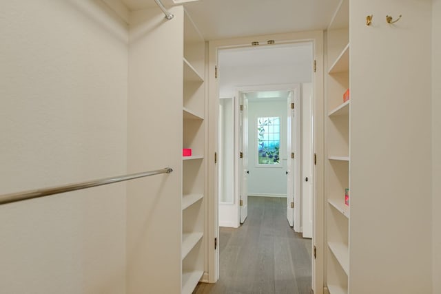910 Old Stonehedge St, Austin, TX 78746 - spacious closet with wood finished floors