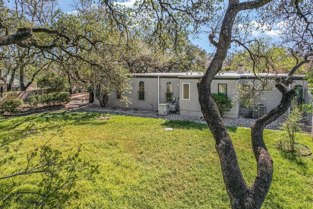 910 Old Stonehedge St, Austin, TX 78746 - view of front of house featuring stucco siding