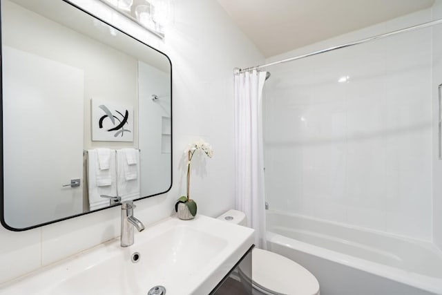 12303 Bainbridge Ln, Austin, TX 78750 - bathroom featuring toilet, shower / tub combo, and vanity