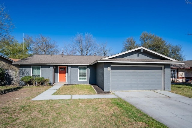 12303 Bainbridge Ln, Austin, TX 78750 - single story home with a garage, a front lawn, concrete driveway, and brick siding