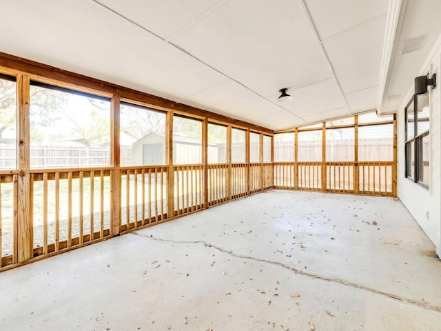 unfurnished sunroom with visible vents