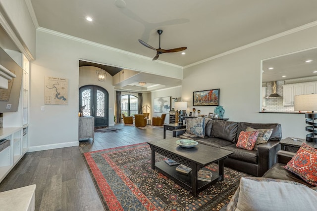 3012 Driftwood Ln, Horseshoe Bay, TX 78657 - living area with ceiling fan, dark wood-style flooring, crown molding, recessed lighting, and arched walkways