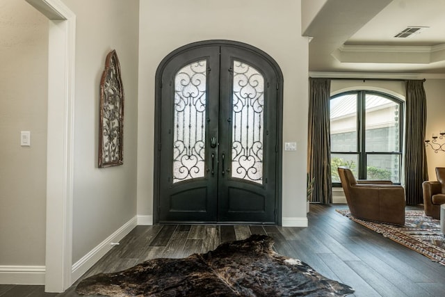 3012 Driftwood Ln, Horseshoe Bay, TX 78657 - foyer featuring french doors, dark wood-style floors, ornamental molding, and baseboards