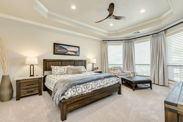 3012 Driftwood Ln, Horseshoe Bay, TX 78657 - bedroom with a raised ceiling, light colored carpet, crown molding, multiple windows, and recessed lighting