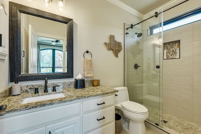 3012 Driftwood Ln, Horseshoe Bay, TX 78657 - bathroom featuring crown molding, vanity, a shower stall, and toilet