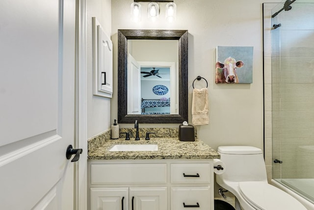 3012 Driftwood Ln, Horseshoe Bay, TX 78657 - bathroom with vanity, toilet, and shower / washtub combination