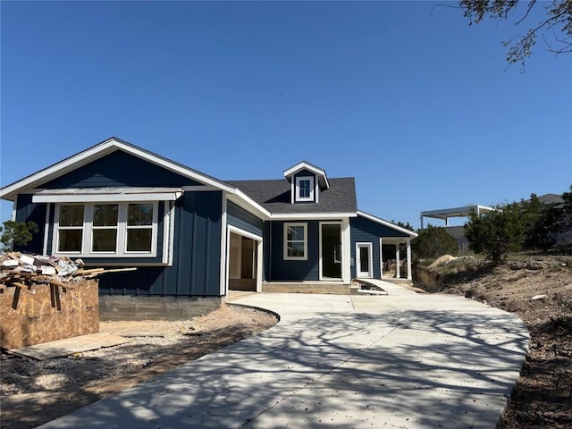 4004 Rockpark Cir, Leander, TX 78645 - view of front of home with board and batten siding and a porch