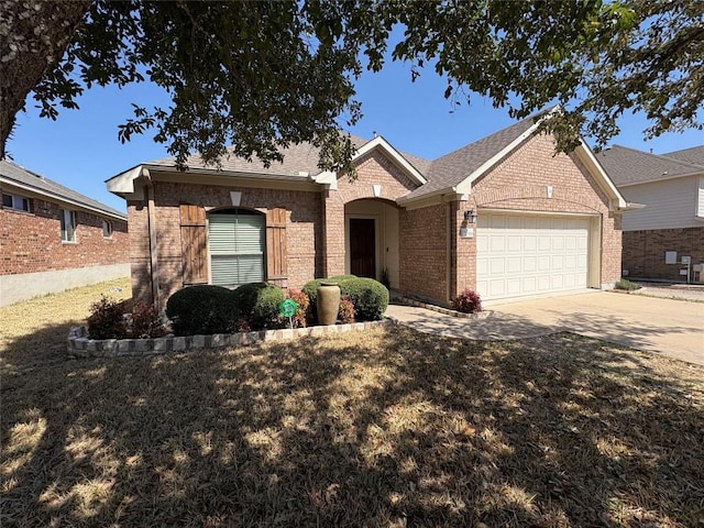 2316 Dovetail St, Pflugerville, TX 78660 - single story home featuring brick siding, an attached garage, and concrete driveway
