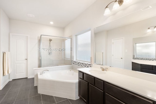 277 Biscayne Bay Bnd, Kyle, TX 78640 - full bathroom featuring a garden tub, a stall shower, and vanity