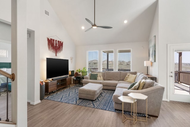 277 Biscayne Bay Bnd, Kyle, TX 78640 - living room with high vaulted ceiling, wood finished floors, ceiling fan, and recessed lighting