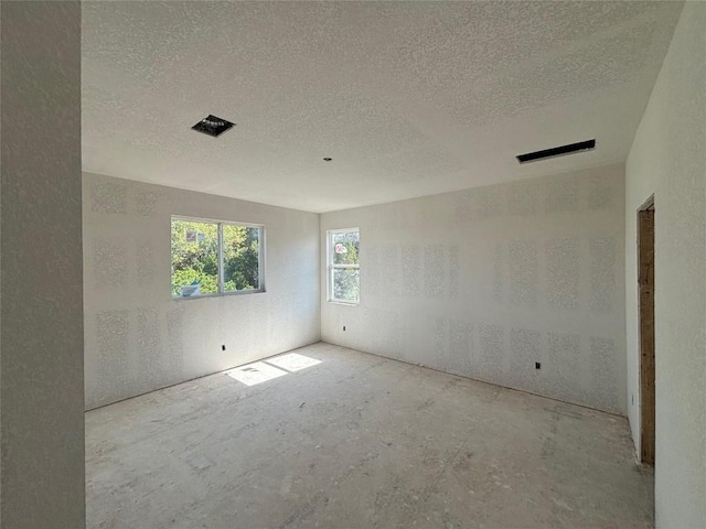 20110 Lee Ln, Lago Vista, TX 78645 - empty room with a textured ceiling