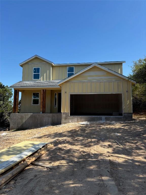 20110 Lee Ln, Lago Vista, TX 78645 - view of front facade with a garage and driveway