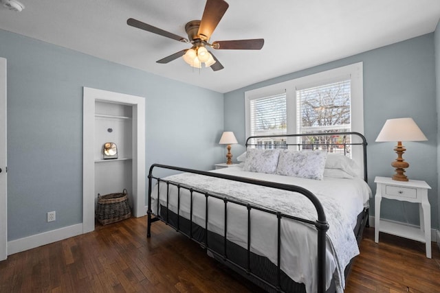 1407 S Myrtle St, Georgetown, TX 78626 - bedroom with hardwood / wood-style flooring, baseboards, and a ceiling fan