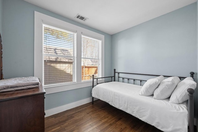 1407 S Myrtle St, Georgetown, TX 78626 - bedroom with hardwood / wood-style floors and baseboards