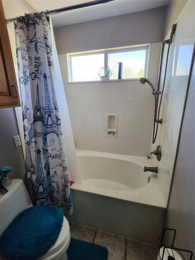 full bath featuring shower / bathtub combination with curtain, tile patterned floors, and toilet