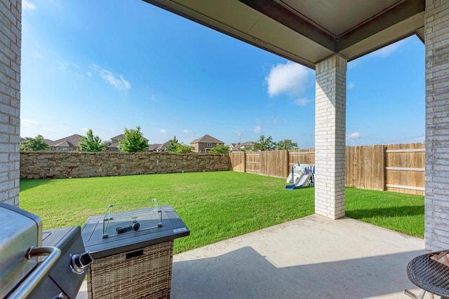 view of yard featuring a fenced backyard and a patio