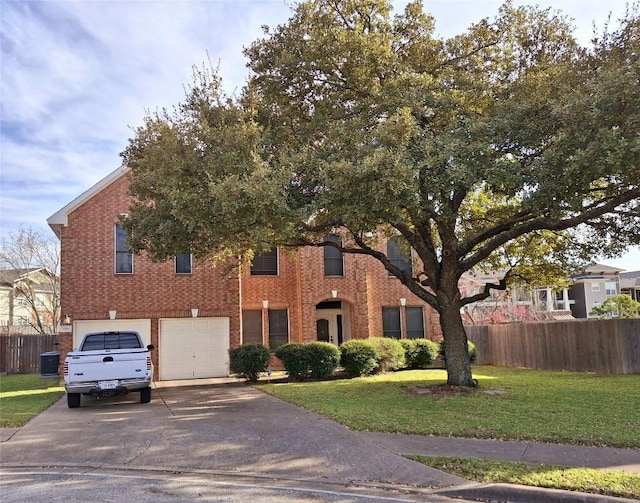 1709 Camas Dr, Austin, TX 78728 - view of front facade featuring driveway, a garage, and brick siding