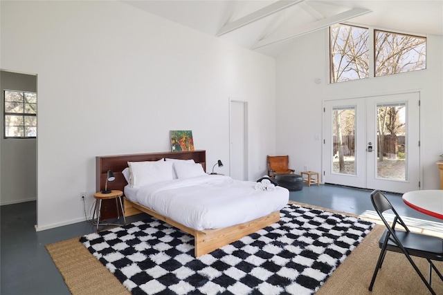 305 Reimer Ave, San Marcos, TX 78666 - bedroom featuring high vaulted ceiling, access to exterior, french doors, multiple windows, and beamed ceiling