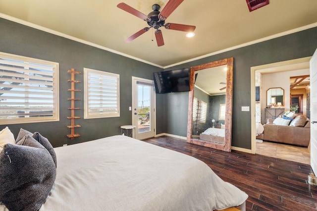 bedroom with baseboards, ornamental molding, visible vents, hardwood / wood-style flooring, and access to exterior