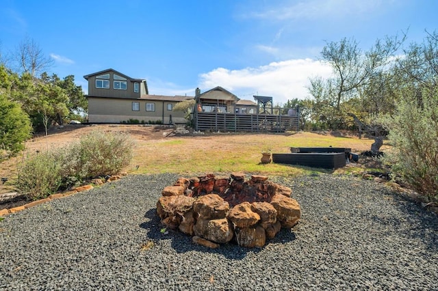 view of yard featuring a fire pit