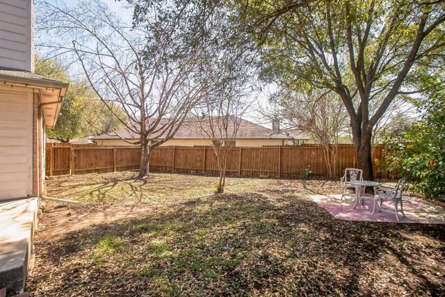 12316 Sugar Leaf Pl, Austin, TX 78748 - fenced backyard featuring a patio area