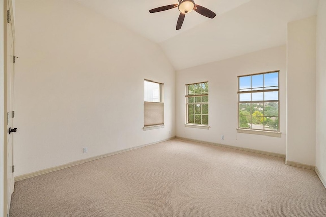 12029 Portobella Dr, Austin, TX 78732 - spare room featuring light carpet, baseboards, ceiling fan, and lofted ceiling