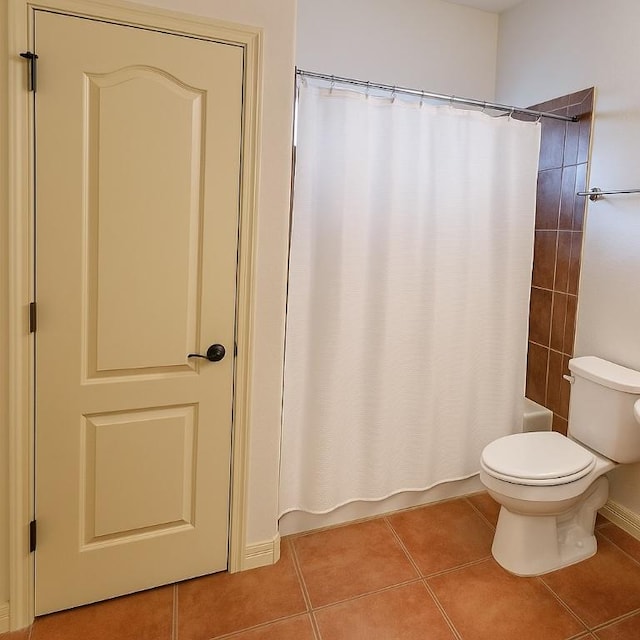12029 Portobella Dr, Austin, TX 78732 - bathroom with tile patterned flooring, toilet, and shower / bath combo with shower curtain