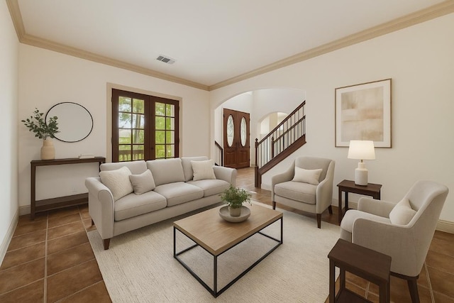 12029 Portobella Dr, Austin, TX 78732 - tiled living area featuring arched walkways, ornamental molding, french doors, baseboards, and stairs