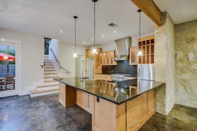 1701 Ravey St, Austin, TX 78704 - kitchen featuring wall chimney range hood, appliances with stainless steel finishes, finished concrete floors, tasteful backsplash, and dark stone countertops