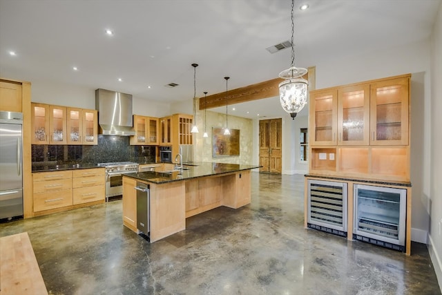 1701 Ravey St, Austin, TX 78704 - kitchen with wine cooler, wall chimney range hood, stainless steel range, backsplash, and recessed lighting