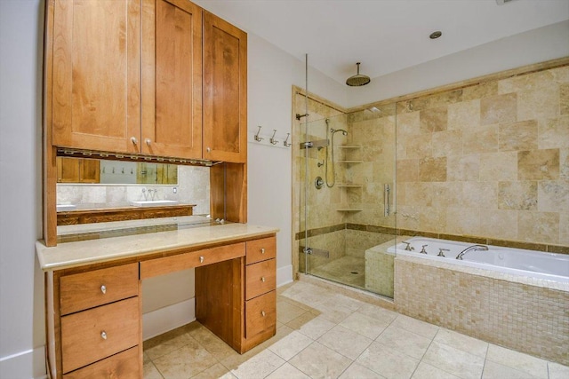 1701 Ravey St, Austin, TX 78704 - full bath featuring a stall shower, vanity, tile patterned floors, and a garden tub