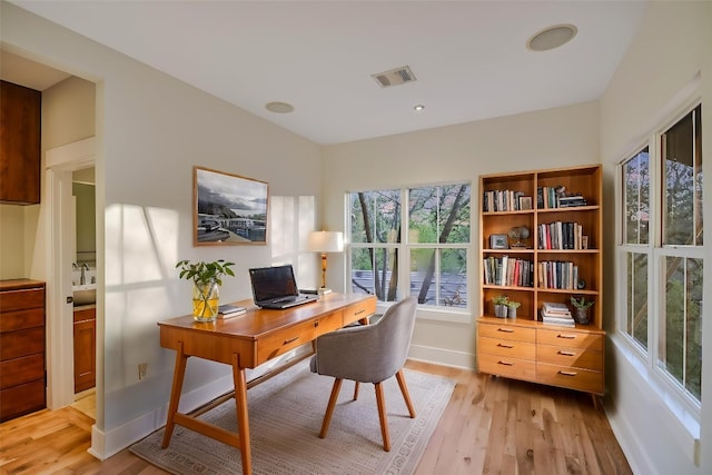 1701 Ravey St, Austin, TX 78704 - office area with light wood finished floors and baseboards