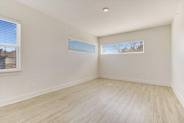 1715 Enfield Rd Unit 302, Austin, TX 78703 - empty room featuring healthy amount of natural light and light wood-style floors
