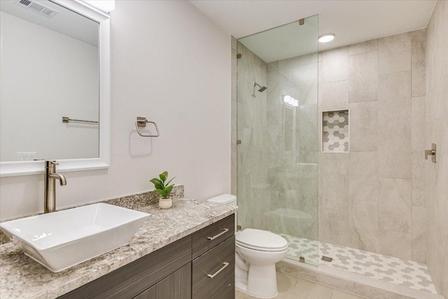 1715 Enfield Rd Unit 302, Austin, TX 78703 - full bath with tiled shower, vanity, and tile patterned flooring