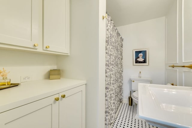 1907 W 36th St, Austin, TX 78731 - bathroom with toilet and a shower with curtain