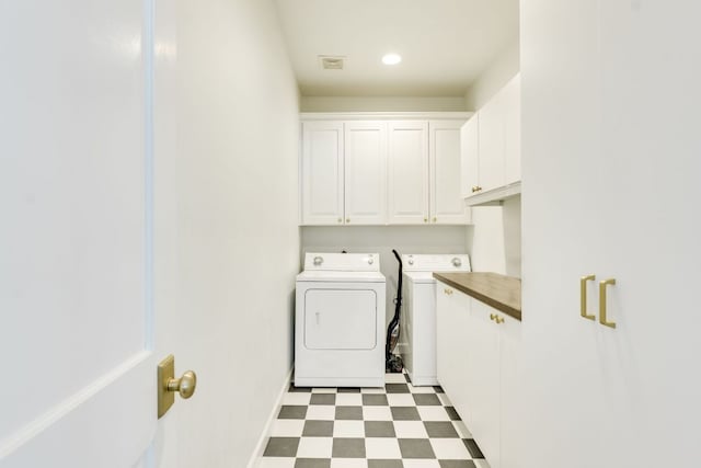 1907 W 36th St, Austin, TX 78731 - laundry room with separate washer and dryer, cabinet space, and tile patterned floors