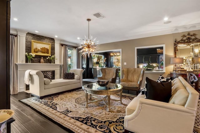 10105 Shinnecock Hills Dr, Austin, TX 78747 - living area with a chandelier, wood finished floors, and recessed lighting
