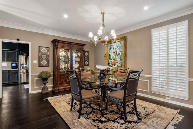 10105 Shinnecock Hills Dr, Austin, TX 78747 - dining space with a chandelier, crown molding, and dark wood-style floors