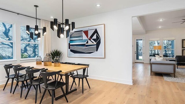309 Golden Sage Ave, Georgetown, TX 78633 - dining area featuring light wood-style floors, a chandelier, and recessed lighting