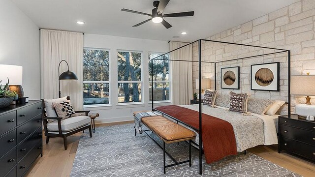 309 Golden Sage Ave, Georgetown, TX 78633 - bedroom with wood finished floors and recessed lighting