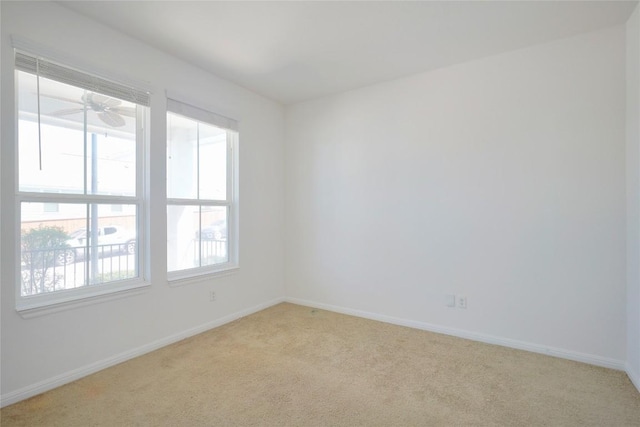 233 Quemado Dr, Leander, TX 78641 - spare room with light carpet and ceiling fan
