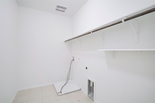 laundry area with electric dryer hookup, baseboards, washer hookup, visible vents, and laundry area