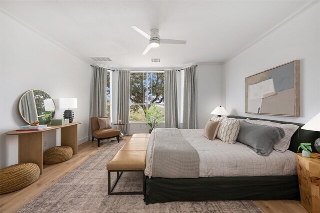 9943 Derecho Dr, Austin, TX 78737 - bedroom with crown molding, wood finished floors, and ceiling fan